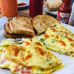 Veggie Omelette dressed up w/ a little Frank's Original RedHot Sauce.