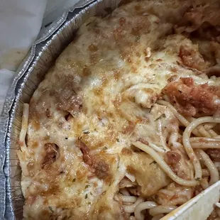 The deceptive cheese covering the dry spaghetti, at least add salt to the water for the noodles