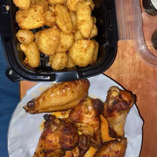 Buffalo chicken wings and cheese curds