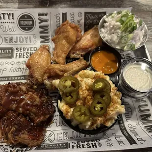 Pulled pork, wings, jalapeño Mac and cheese, potato salad-all delicious