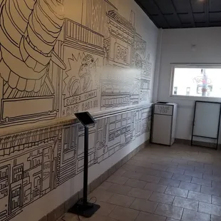 a drawing on the wall of a restaurant
