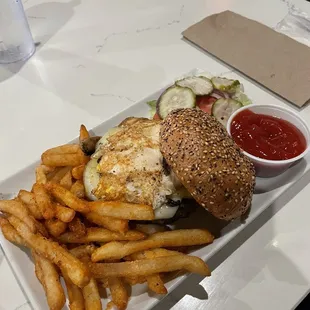 Burger with Swiss, egg, and grilled mushrooms