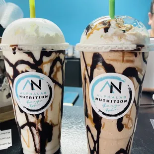 two milkshakes on a table