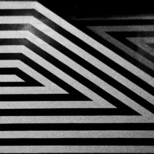 a black and white photo of a geometric pattern