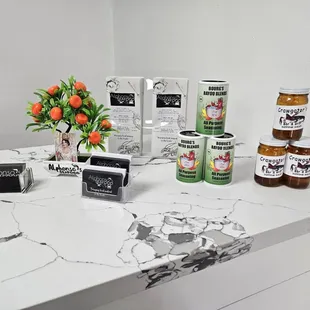 a counter with a variety of food items