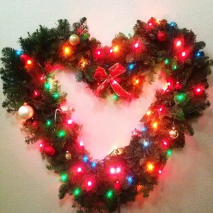 Two candy cane wreaths put together to make a heart!!! Love this tree lot!