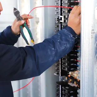 Our team of highly skilled electrical technicians working on the new Sessions Climbing Gym.