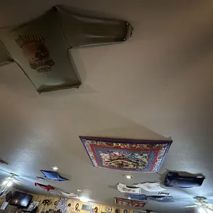 Various items pinned to the ceiling added to the ambiance