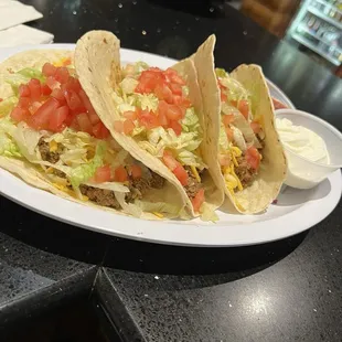 Tuesday Tacos  3 Soft Shells ground beef with side of sour cream &amp; salsa