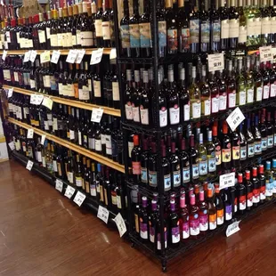 a large display of wine bottles
