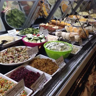 a variety of salads on display