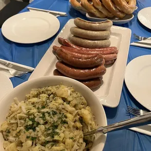 a bowl of sauerkraut and a plate of pretzels