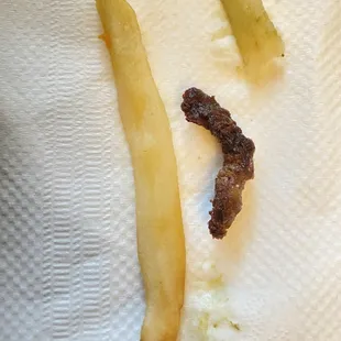 a close up of a piece of food on a napkin