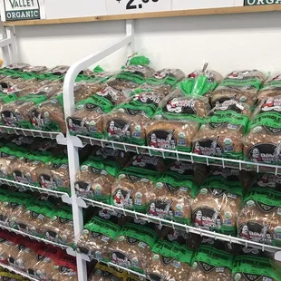 a display of a variety of breads