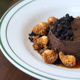 a chocolate dessert on a white plate