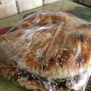 Fresh baked pillows of bread with black sesame