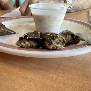 Dolmas cut to show what's inside. Tangy and creamy and delicious!