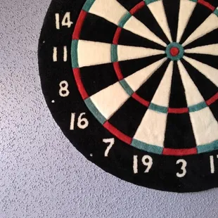 Hit the bullseye in a game of darts