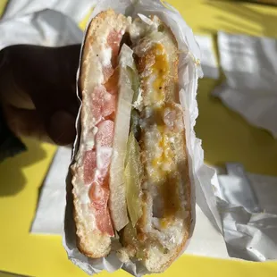 Inside fish sandwich w/cheese + raw onion