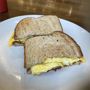 a breakfast sandwich on a plate