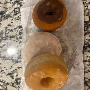 three different flavors of donuts