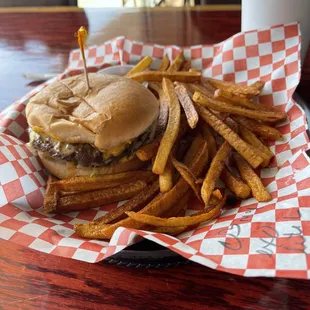 Cheeseburger extra onions. with fries. Dr Pepper drink.
