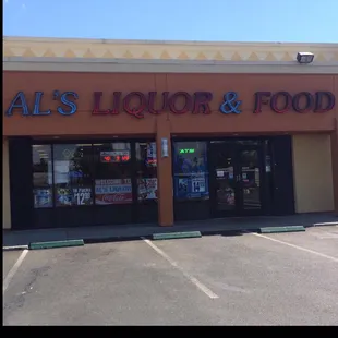 the front of a liquor and food store