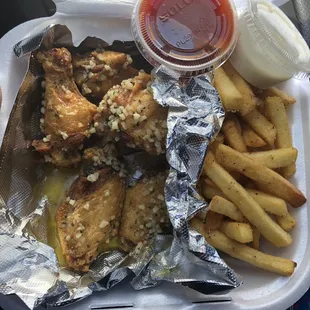 5 Garlic wings and fries combo . Comes with a drink for around 8 dollars