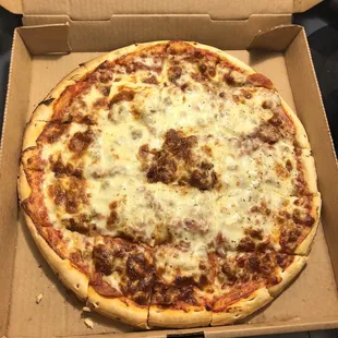 Pepperoni, sausage, and bacon pizza