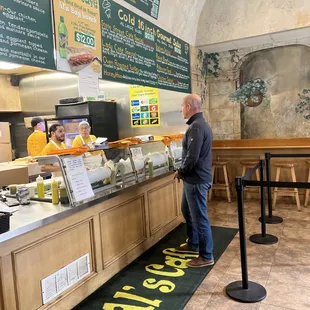 a man standing in front of the counter