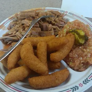 Coarse Chopped Pork BBQ, Hushpuppies and BBQ slaw.