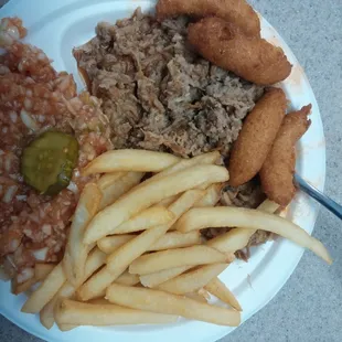 Chopped pork plate with fries and slaw.