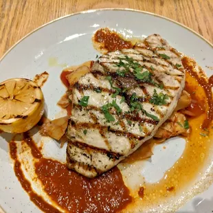 Grilled Swordfish with Artichoke Caponata, Romesco Sauce, Grilled Lemon ($36)