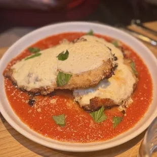 Chicken Parmesan - roasted tomato sauce, mozzarella, basil