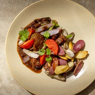 Lomo saltado made with beef tenderloin