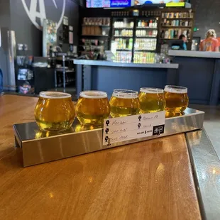 Right to left: Maui Waui IPA, Shot Away IPA, Juice Above the Clouds IPA, Mac Drizzle Platinum IPA, Hella Hoppy IPA