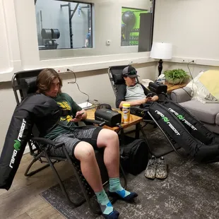 Athletes enjoying our Recovery Lounge