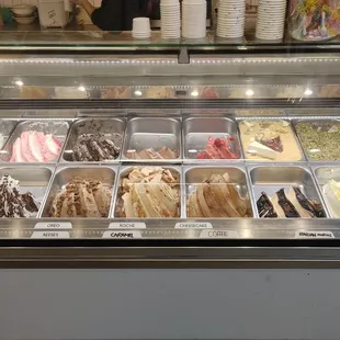 a display of different flavors of gelato