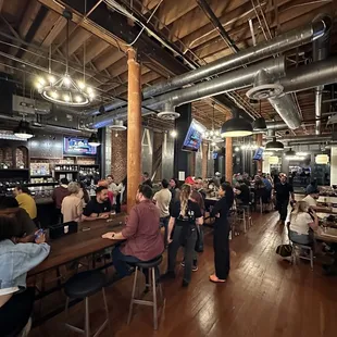 a large group of people sitting at tables