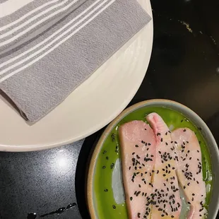 HAMACHI CRUDO* yuzu, basil, serrano, black sesame $14