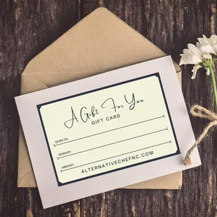 a gift card and a flower