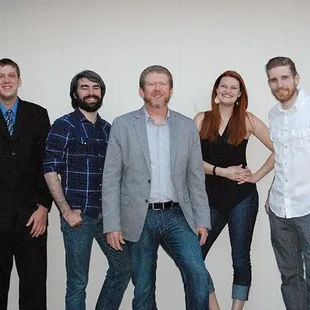 a group of people posing for a picture