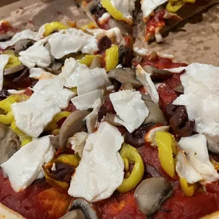 Vegan cheese with mushroom, banana peppers and olives