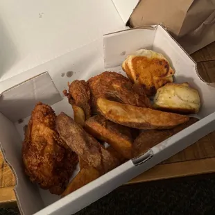 2 Pieces Fried Chicken Dinner with jojos, salad and garlic knots.