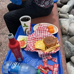 a woman sitting on a picnic table