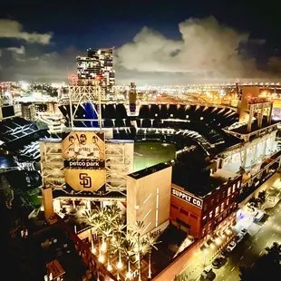 an aerial view of a baseball stadium at night