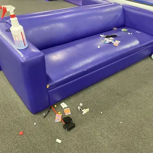 Trash from the other couch.