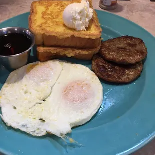 Two French toast, 2 eggs and subbed sausage patties. Side of real maple syrup!