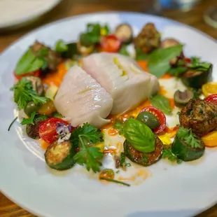 Eureka Black Cod - roasted under salt &amp; herb crust, squash, frittella di zucchine, cherry tomato, capers, castelvetrano olives, passato