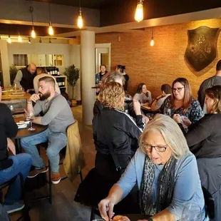 a large group of people sitting at tables